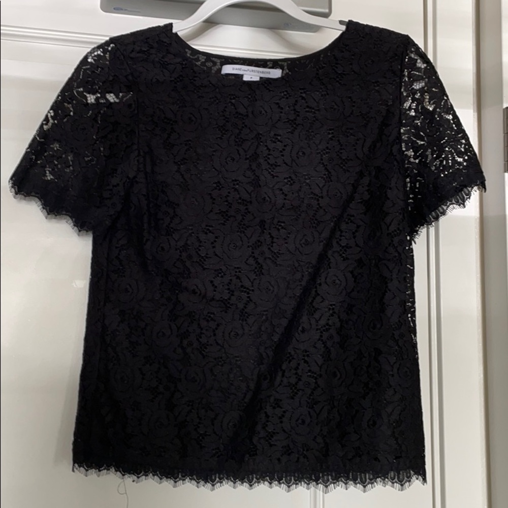 Beautiful lace top with sheer sleeves